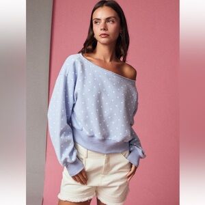 935. Polka dot off shoulder sweatshirt in blue